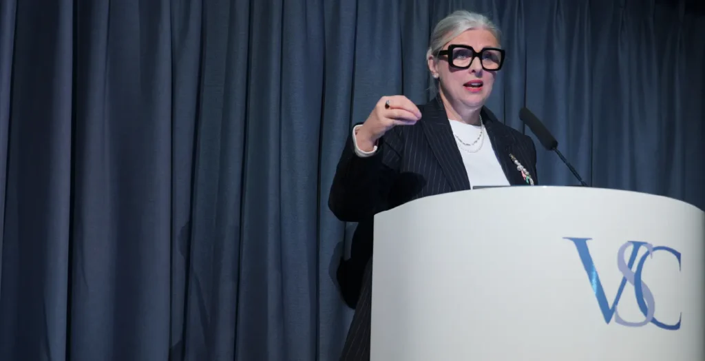 Woman speaking at a conference